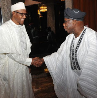 Buhari and Obasanjo exchanging pleasantry 
