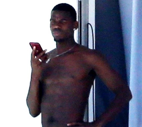 Paul Pogba shows off his eggplant as he goes shirtless in new photos