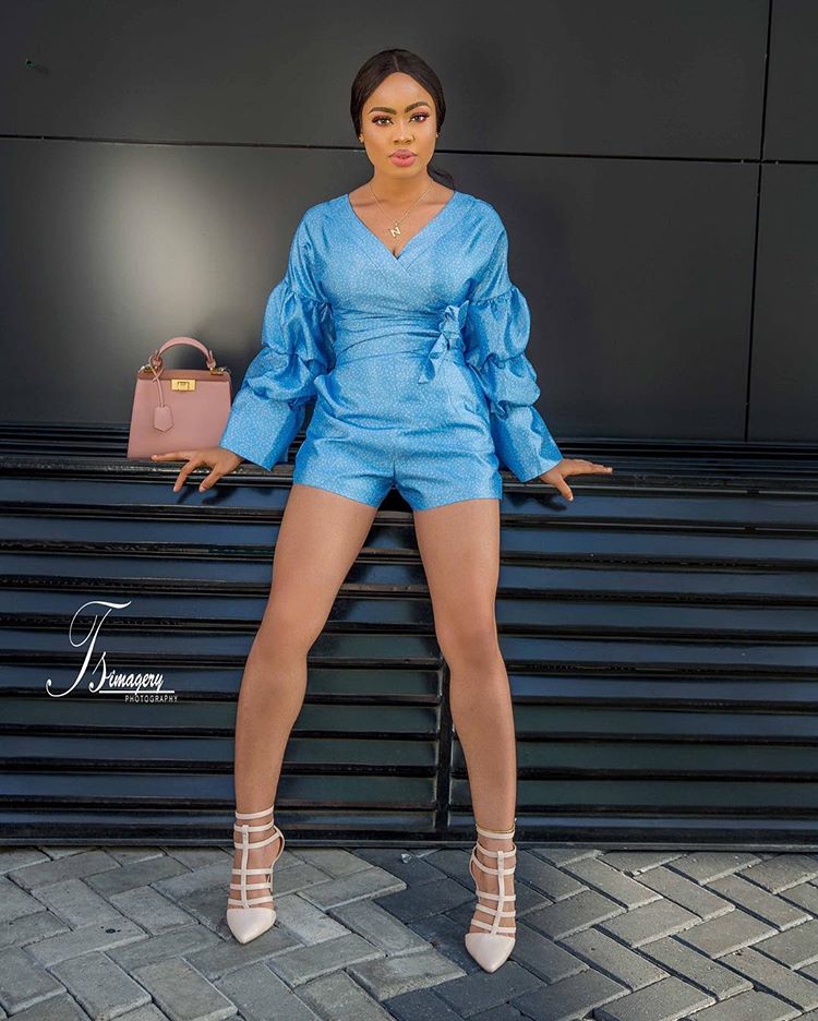 Nina Ivy flaunts hot legs in a blue outfit