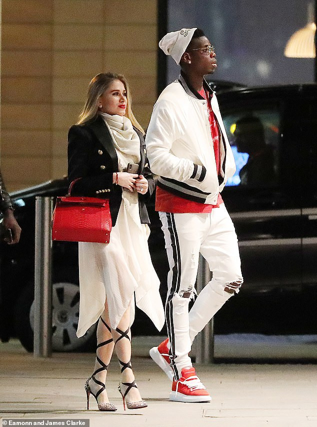 Paul Pogba makes a rare outing with his stunning girlfriend Maria Salaues after welcoming their first child (Photos)