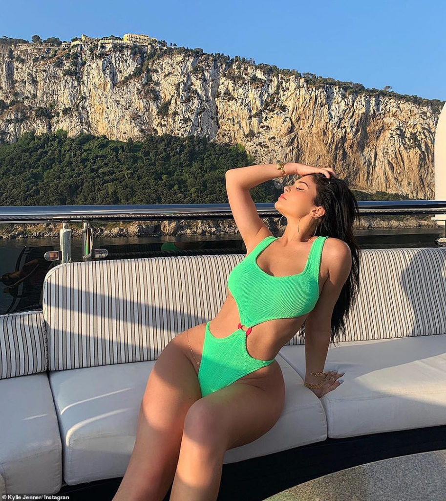 Kylie Jenner showcases her curves in tiny thong swimsuit